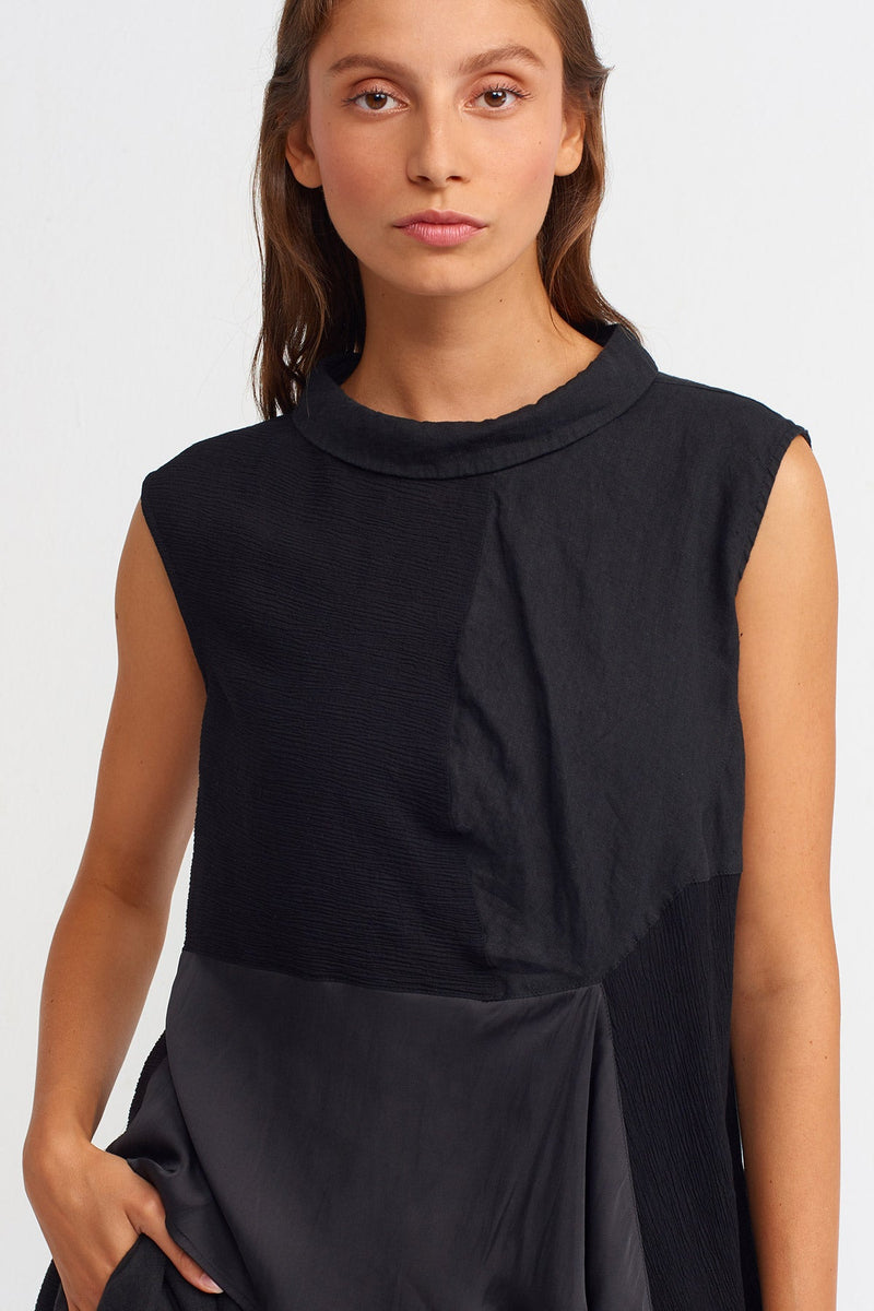 Nu Solid Sleeveless Asymmetrical Blouse Black